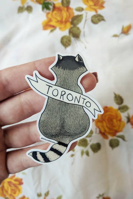 grey Toronto raccoon - vinyl sticker